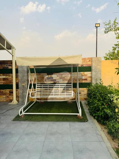 Outstanding 12-Kanal Resort Style Farmhouse Near DHA Phase 6 & 7 Available for Daily Rent A Perfect Blend of Luxury, Nature and Comfort with Private Pool, Spacious Outdoor Area and Event Friendly Environment