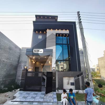 3 Marla double story house fr sale brand new home ideal and hot loction carpet road water electricity available 3D ultra model design Spanish look furnished home with wood work gated society 24 hour security guard near sozo water park near canal road near park