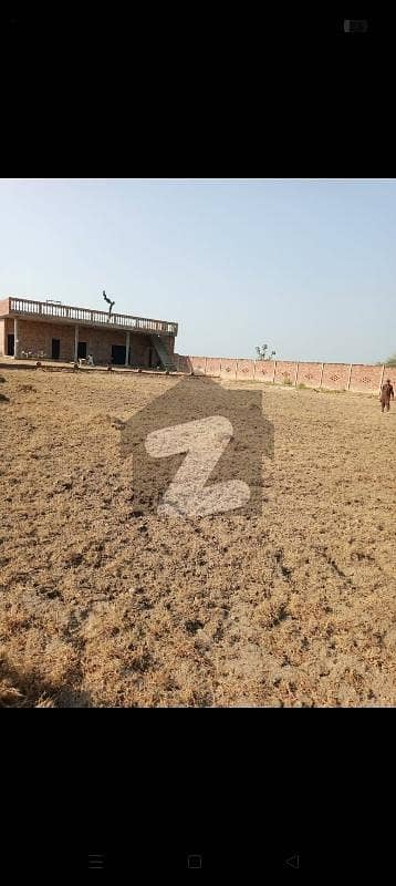 14kanal form house corner main road 50ft side road 25ft rigstry intiqal totally solid wall covered wall Haight 7ft 9marla construction one 1.5marla bed room 3marla hall 4.5 Marla bramda pic atach sup tic tank bana Huwa gray stucher bijli Pani gass majood rc lanter covered area & 14 canal boundary wall solid