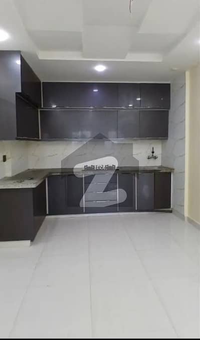 Flat For Sale in Bhayani Heights Ground Floor 2 Bedroom Drawing Lounge American kitchen Tile Floor Key Available anytime visit Your dream flat, make it yours today!