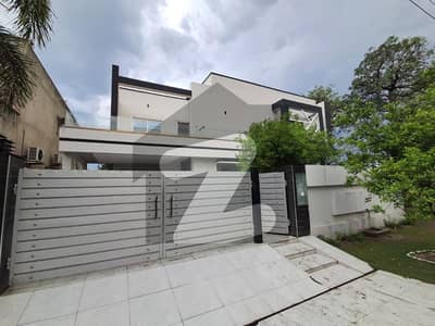 DOUBLE UNIT CORNER 1-KANAL OWNER BUILD ELEGANT AND FULLY MAINTAINED SUPER HOT LOCATED BUNGALOW IS AVAILABLE IN THE BEST BLOCK OF SUI GAS SOCIETY PHASE 1 ADJACENT PHASE 5 DHA LAHORE.