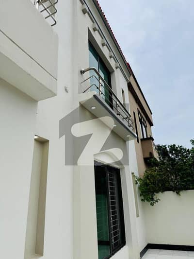 10 Marla Slightly Used Good Condition House For Sale In OVERSEAS Block BAHRIA Town Lahore
