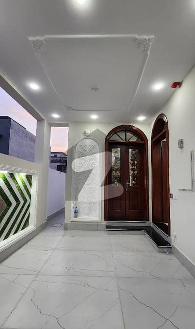 "Brand New 5 Marla Spanish Villa | A1 Luxury Finish in DHA Rehbar 11 Sector 2 | 3 Beds Attached Baths + 2 Kitchens + 2 TV Lounges | Prime Location Masterpiece!"