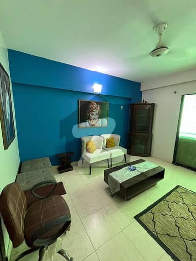 Beautifully Furnished & Well Maintained 2 Bed Drawing & Dining Apartment In A Family Building With Lift Is Available For Rent At Prime Location Of Bukhari Commercial, DHA