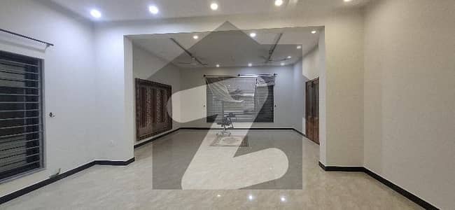 1kanal upper portion/3 bedrooms with. 4 bathrooms dining room TV launch kitchen car parking all facilities in life available