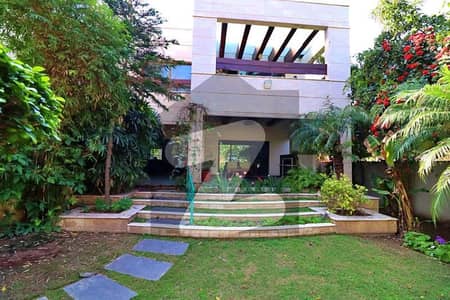 TOP LOCATION 4-KANAL ELEGANT AND FULLY MAINTAINED SUPER HOT LOCATED BUNGALOW IS AVAILABLE IN THE BEST BLOCK OF PHASE 5 NEAR RAYA DHA LAHORE ORIGINAL PICTURES ATTACHED