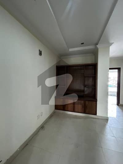 SPRING NORTH APARTMENT 2 BEDROOM ATTACH BATH KITCHEN TV LAWN MAIN XPRESS WAY FACE BIG PARKING SPACE PRIME LOCATION NEAR ASKARI BANK