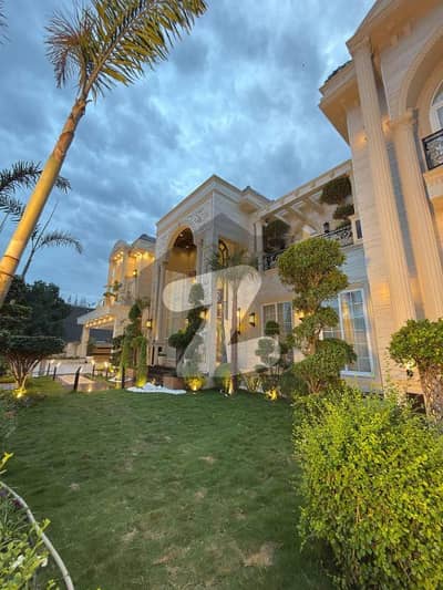 FULL FURNISHED WITH POOL, THEATRE, GYM AND LIFT 2-KANAL ELEGANT AND BRAND NEW SUPER HOT LOCATED BUNGALOW IS AVAILABLE IN THE BEST BLOCK OF DHA LAHORE