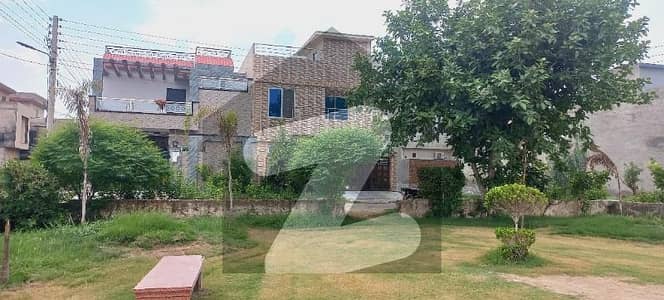 10 Marla Residential Plot For Sale Facing Park Al Haram Garden, Lahore
