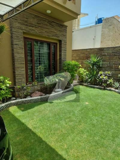 DHA PHASE 5 500 YARDS 5 BEDROOMS SLIGHTLY USE BUNGALOW IS UP FOR URGENT SALE