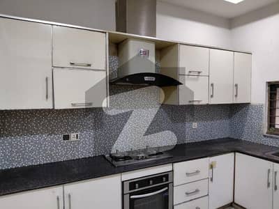 10 Marla Tile floor luxury full independent house is for rent in Wapda Town phase1 Block K3.