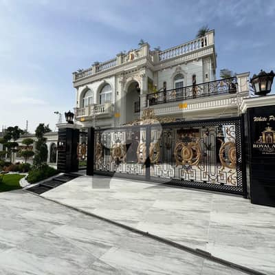 One Kanal Spanish White Bungalow Showcasing A Striking Blue Dome