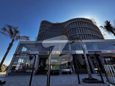 Shop for sale in i8 markaz with rental value of of more than 600,000 per month