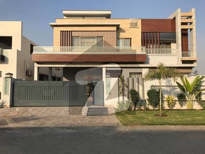 21 MARLA CORNER(FACING PARK) DOUBLE UNITE/DOUBLE GATE SLIGHTLY USED ELEGANT AND FULLY MAINTAINED SUPER HOT LOCATED BUNGALOW IS AVAILABLE FOR SALE IN DHA PHASE 5 .