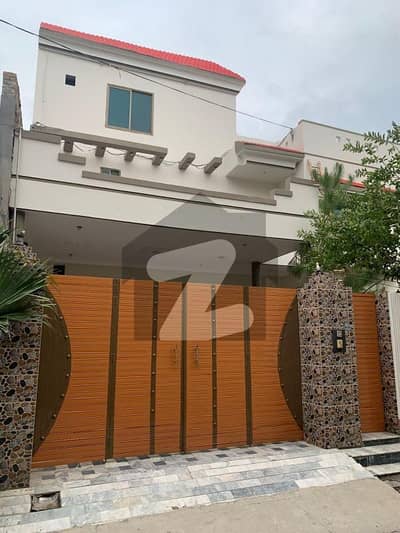12 Marla Residential Property Featuring Two Separate House Units With Separate Entrances.