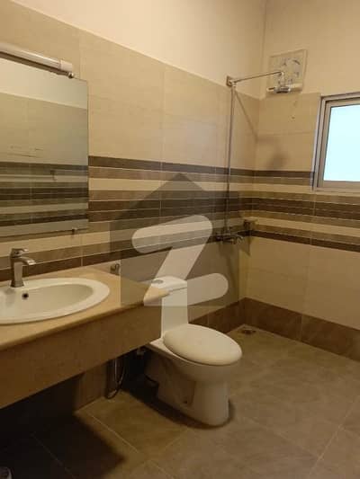 A beautiful upper portion for rent ideal location All marble flooring near to market close to double road Big parking