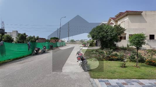 1-KANAL PRIME LOCATION IN T BLOCK,DP, POLE CLEAR PLOT . VERY CLOSED TO MAIN ROAD AND PARK, DIRECT DEAL WITH PLOT OWNER.