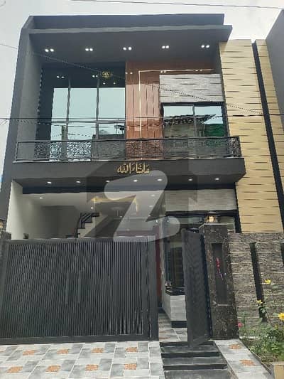 5 Marla double story house fr sale brand new home ideal and hot loction carpet road water electricity available 3D ultra model design Spanish look furnished home with wood work gated society 24 hour security guard near sozo water park near canal road bank finance available double hite story