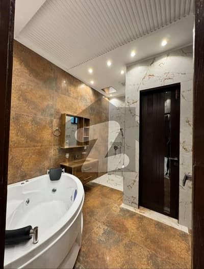 in DHA 11 Rahbar sectar 1 black,E electric City metar 2