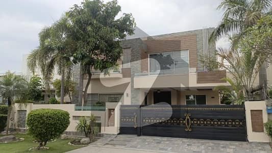 SEMI FURNISHED 20 MARLA ELEGANT AND FULLY MAINTAINED SUPER HOT LOCATED BUNGALOW IS AVAILABLE IN THE BEST BLOCK OF DHA LAHORE.