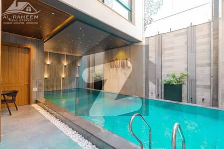 INDOOR SWIMMING POOL 1 KANAL CORNER FULL BASEMENT ULTRA MODERN BUNGALOW FOR SALE IN DHA PHASE 6 NEAR TO RAYA.