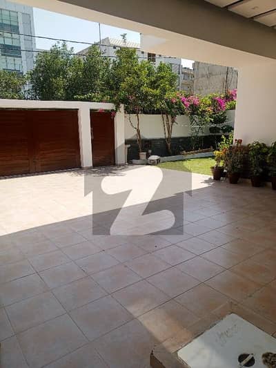 DHA PHASE 6 KHY E SHAHBAZ 500 YARDS 6 BEDROOMS TILE FLOORING BUNGALOW IS UP FOR URGENT SALE