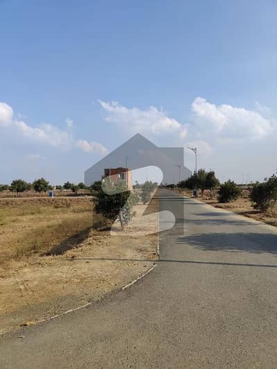 10 Marla Semi Corner Plot Nearby Park and Main Boulevard Almost Ground Level Plot Development Charges Paid Ready for Possession