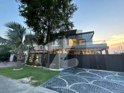 SEMI FURNISHED 20 MARLA ELEGANT AND FULLY MAINTAINED SUPER HOT LOCATED BUNGALOW IS AVAILABLE IN THE BEST BLOCK OF DHA LAHORE ALL ACS AND CURTAIN INSTALLED WITH ORIGINAL PICTURES ATTACHED