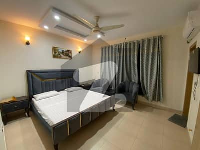 Two bedroom apartment four rent available Gulbug green Lslamabad full furnished