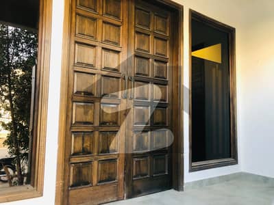 100yd Bungalow with Basement Kh e Abdaali