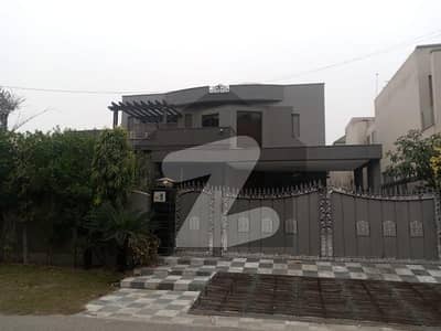 ON WIDE 70 FEET ROAD FULL BASEMENT FULLY FURNISHED ELEGANT AND FULLY MAINTAINED SUPER HOT LOCATED BUNGALOW WITH DIAR WOODWORK AND 10 KVA SOLAR INSTALLED IS AVAILABLE IN THE BEST BLOCK OF DHA LAHORE.