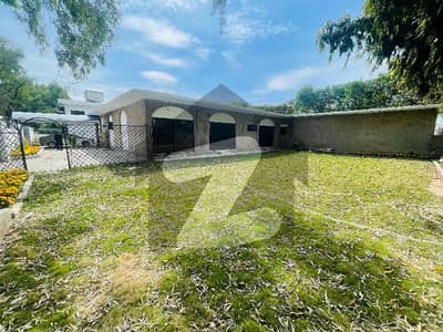 Elegant 4-Bedroom Single-Story Residence with Expansive Garden