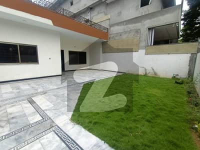 Prime Location 4 Bedroom House with Spacious Lawn