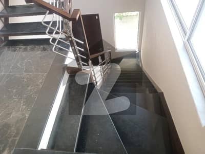 1kanal Upper portion 3bed Room with attached bath lounge kitchen store Side Terrace 1 Car Parking available