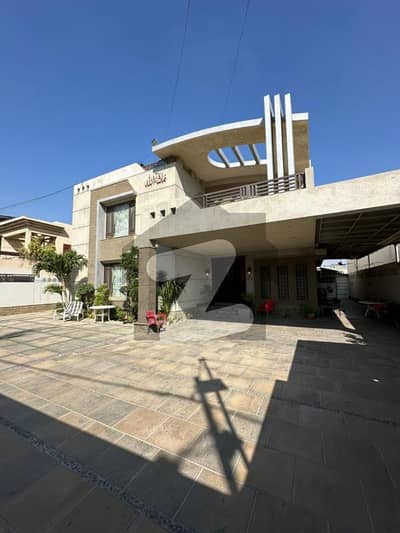 ڈی ایچ اے فیز 6 ڈی ایچ اے ڈیفینس,کراچی میں 4 کمروں کا 2 کنال مکان 27.0 کروڑ میں برائے فروخت۔