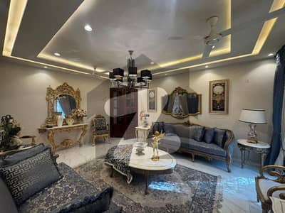 Luxurious Fully Furnished 1-Kanal Modern Bungalow with Full Basement in DHA Phase 5 5 Bed Elegant Living, Prime Location & Motivated Seller Deal by Wall Green Realtors