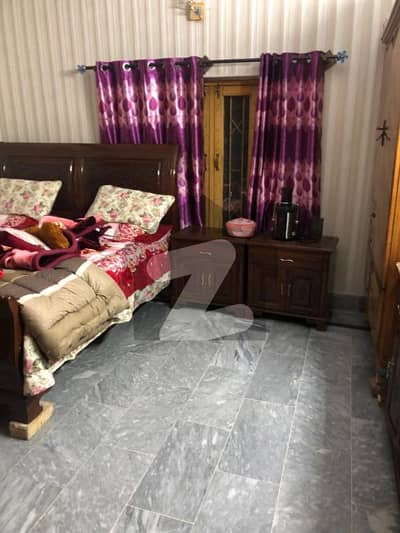 10 Marla Four-Story Semi-Commercial Building for Sale Ideal for Hostel or Investment