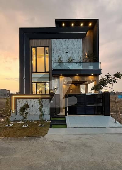 On Wide 50-Feet Road 5-Marla Brand New Luxury Ultra-Modern Design Most Beautiful Bungalow For Sale At Prime Location Of DHA Lahore Near To Park Masjid & Commercial Market.
