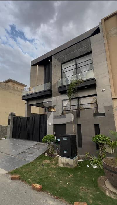 On Wide 50-Feet Road 5-Marla Brand New Luxury Ultra-Modern Design Most Beautiful Bungalow For Sale At Prime Location Of DHA Lahore Near To Park Masjid & Commercial Market.
