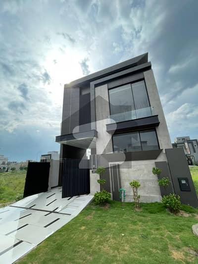 On Wide 50-Feet Road 5-Marla Brand New Luxury Ultra-Modern Design Most Beautiful Bungalow For Sale At Prime Location Of DHA Lahore Near To Park Masjid & Commercial Market.