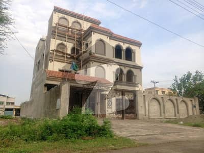 1 Kanal Triple Story Grey strucure House for Sale Ideal for Girls Hostel / High Rental Income