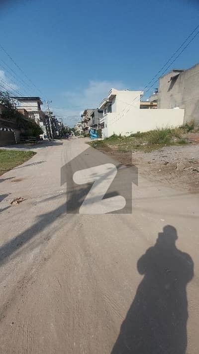 6 Marla Corner Plot For Sale Airport Housing Society Sector 04 Block E Iqbal Road Main Boulevard Prime Location Carpeted Road Streets Electric Gas All Facilites Available  Deal With Direct Owner