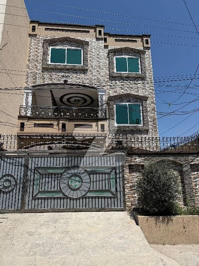 10 marla 3 story beautiful house for sale National Housing scheme 1 before Gulshan abad Rwp.