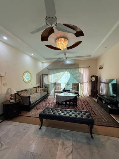 20 MARLA ELEGANT AND FULLY MAINTAINED SUPER HOT LOCATED BUNGALOW IS AVAILABLE IN THE BEST BLOCK OF DHA LAHORE