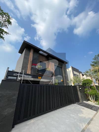One Kanal Brand New Luxury Ultra-Modern Design Most Beautiful Fully Furnished Rooftop Garden Bungalow 2 Servant Quarter In Basement For Sale At Prime Location Of DHA Lahore