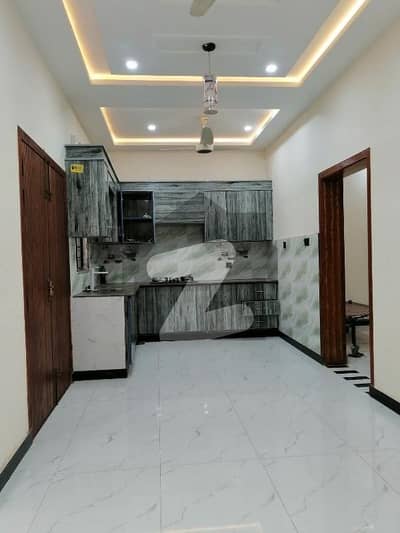 5 Marla Double story brand new house Bedrooms. 4 with bathrooms. 4/dining room TV launch kitchen car parking all facilities in life available