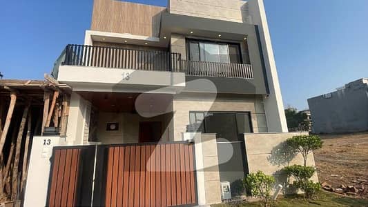 5 marla brand new designer house 3 bed accommodation 1 American kitchen 1 Servent two species TV lounge available for sale in Bahria Enclave