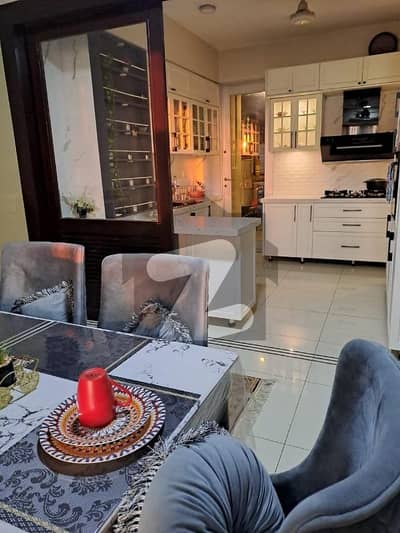 Furnished Flat UBL facing Tower 1 having 4 bed attached bath drawing dinning everything attached on flat total worth cost around 50 lacs  Ac, refrigerator, bedrooms sets , lcds, Sofas, dinner sets etc etc including 1 more reserve car parking.