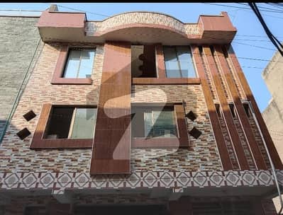8 MARLA COMMERCIAL BUILDIND 4 STORIES WITH BASEMENT PRIME LOCATION FOR SALE IN ALI TOWN LAHORE