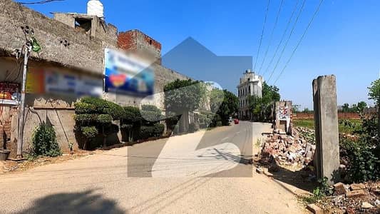 PRIME LOCATION PLOT ON SJ GARDEN BLOCK B POSSESSION SORROUNDING HOUSES